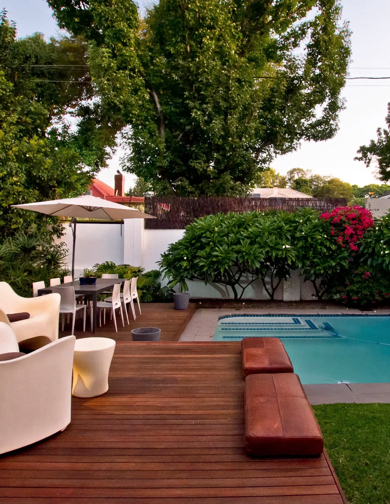 Pool deck with white loungers